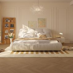 a white bed sitting in a bedroom on top of a hard wood floor