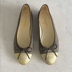 Worn Once Green/ Brown/ Beige With Brown Piping Gold Metallic Toe Box 1/2 Inch Heel Spring Collection Chanel Ballerina Flats, Chanel Ballerina, Shoes Chanel, 2 Inch Heels, Flat Color, Ballerina Flats, Chanel Shoes, Chanel Ballet Flats, Brown Beige