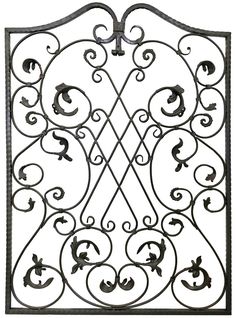 an iron gate with decorative designs on the top and bottom, is shown in black