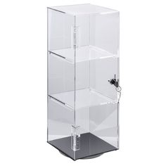 a clear display case with three drawers