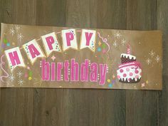 a happy birthday banner with a cake on it