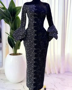 With little detailing, the beauty of this african print dress leaves you ravishing in all its goodness Elegant Fitted Dresses In Ankara Fabric, Elegant Ankara Fabric Maxi Dress For Wedding, Elegant Ankara Maxi Dress For Wedding, Elegant Ankara Party Dress, Elegant Fitted Ankara Dresses, Party Dress With Ankara Fabric And Floral Print, Elegant Long Sleeve Dresses With Batik Print, Long Sleeve Ankara Maxi Dress For Parties, Party Dress With Floral Ankara Print