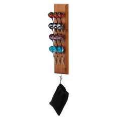 a wooden rack with several pairs of skis hanging from it