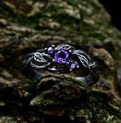 a close up of a ring on a rock