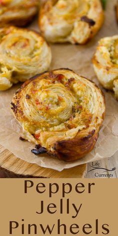 some food is sitting on top of a piece of paper with the words pepper jelly pinwheels