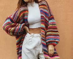 "Rainbow mohair cardigan with color stripes  HANDMADE  ONE SIZE PRE-ORDER ✔️25%wool ✔️24% mohair ✔️51% acrylic  ❗️If you have another preferences in dimensions please contact me ❗️ Dimensions: Length - 87 cm. /34.25 inch. Width - 65 cm. /25.5 inch. Sleeve lenght - 62 cm. /24.4 inch. Sleeve width - 27 cm. /10.6 inch.  Model measurements: Height - 1.7 cm/ 5'7\"  Bust - 90 cm/ 35.43\" Waist - 65 cm/ 25.5\" Hips - 92 cm/ 36.2\" Hand knit women's color mohair cardigan. Multi color knit cardigan great part of your outfit. This rainbow stripes cardigan is the best design in this color. Mohair knit cardigan is a beautiful cloth in your wardrobe especially this is an arm knit jamper Soft knit cardigan, oversized cardigan is the best women warm cardigan and women jamper.  Exclusive and beauty. Mohai Multicolor Cardigan, Knitted Stuff, Pull Mohair, Soft Knit Cardigan, Warm Cardigan, Mohair Knit, Purple Cardigan, Plus Size Cardigans, Merino Wool Cardigan