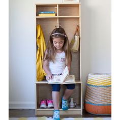 My First Cubby by Little Partners® is a multi-purpose storage solution designed to aid in teaching young kids organizational skills. Offering cubbies, shelves, and 8 industrial grade hardware hooks, My First Cubby simplifies the home. It provides all the nooks and crannies needed to help kids neatly store shoes, jackets, backpacks, and supplies. A small ledge provides a space to sit while putting on or removing shoes, encouraging kids to learn routines whenever they are heading out to their next Organizing Backpacks, Kids Cubbies, Kids Clothing Rack, Playground Safety, Wooden Lockers, Minimize Clutter, Wood Shoe Rack, Nooks And Crannies, Montessori Room