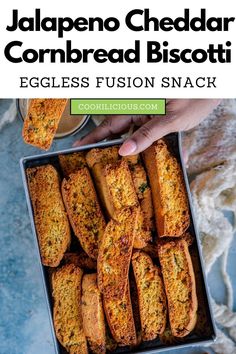 an image of food in a pan with text that reads jalapeno cheddar cornbread biscotti