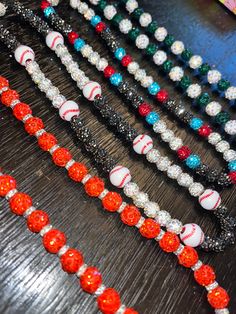 several beads are lined up on a table