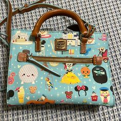 Used Once. Like New Condition. Walt Disney World Park Icons Handbag Dooney Bourke Handbags Disney, Dooney And Bourke Disney Cats, Paw Wallpaper, Dooney And Bourke Handbags Dooney & Bourke, Everyday Purse Dooney & Bourke, Disney World Parks, Dooney & Bourke Bags, Dooney Bourke, Walt Disney World