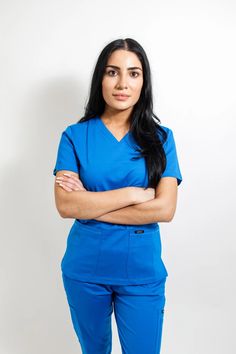 Elevate Your Professional Attire with the 3-Pocket Top for Women Exclusively designed for the discerning professional, the 3-Pocket Women Scrub Top by Jayce Scrubs beautifully merges comfort and style, ensuring you’re ready for any challenge the day brings. Key Features: Sophisticated Material: Woven from a premium blend of fabrics, this top ensures softness on the skin while maintaining durability and breathability for day-long comfort. Dual-Pocket Convenience: Two strategically positioned pock Black Scrubs, Blue Scrubs, Classic Pants, Scrub Sets, Professional Attire, Pocket Top, Top For Women, Scrub Pants, Work Wardrobe