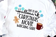 a white shirt that says, this is my hallmark christmas movie watching shirt on it