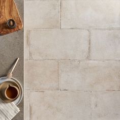 Enjoy the timeless look of travertine with our Seville Pergamo Beige 12x24 Travertine Look Matte Porcelain Tile. Its natural, earthy stone surface has an authentic, antique look at the edges. This versatile, sandy beige tile is enhanced by natural shade variation. Install it by itself on walls or floors, indoors or out—or in combination with other tiles from the Seville collection to achieve a custom look. Warm and elegant, Seville delivers the authentic, rustic look of travertine in durable, af Stone Look Wall, Natural Tile, Rustic Tile, Matte Porcelain Tile, Beige Tile, Ivy Hill Tile, Tile Trends, Concrete Tiles, Stone Surface