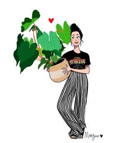 a woman holding a potted plant in her hands and wearing a t - shirt