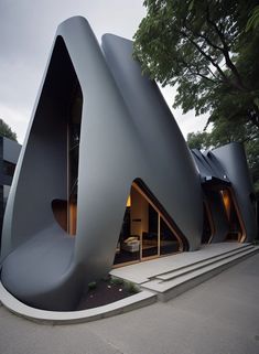 an unusual looking building with stairs leading up to it