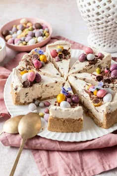 an easter dessert on a paper plate with eggs and candy