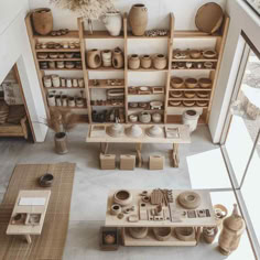 38 Modern Pottery Sanctuaries: Where Minimalism Fuels Artistic Expression Minimal Shop Interior, Clay Studio Aesthetic, Ceramic Home Studio, Ceramic Studio Layout, Pottery Studio Home, Pottery Shelves, Pottery Atelier, Pottery Studio Aesthetic