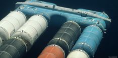 an inflatable raft floating on top of the ocean next to other buoys