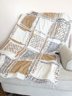 a couch with a blanket on top of it