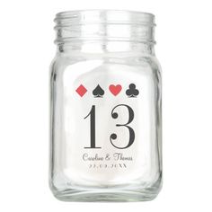 a glass jar with the number thirteen on it