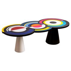 three tables that have different colored circles on top of each other, one is black and the other is white