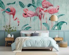 a bedroom with flamingos painted on the wall