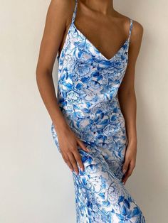 Our blue silk slip dress of midi length is perfect for a party, date and holidays or bachelorette party, as well as for bridesmaids. It's a combination of style, elegance and trends. Dress length is 135cm or 53.15 inches. Combines well with various accessories and various types of shoes, including heels and flat-lays. DETAILS - midi silk slip - sleeveless - adjustable shoulder straps - cowl neck MATERIAL Blend of natural silk and polyester SIZES This dress is available in 3 sizes XS, S and M XS Blue Floral Ruffle Dress, Blue Satin Midi Dress For Spring, Blue Midi Satin Dress For Spring, Blue Satin Midi Slip Dress, Sleeveless Summer Prom Slip Dress, Spring Blue Satin Dress With Bias Cut, Blue Midi Satin Dress, Sleeveless Slip Dress For Summer Prom, Fitted Blue Slip Dress For Summer