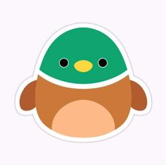 a green and brown penguin sticker on a white background