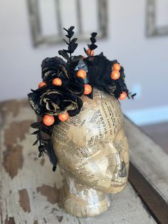 This gorgeous gothic crown features black roses with glittering gold edging, accented with copper glittered black eucalyptus sprays, with glittering orange berries tucked in, on a sturdy headband lined with black leaves, and featuring a silver skull in the center. base is a sturdy headband for a secure fit  Perfect for your Halloween costume! One of a kind and ready to ship! Gothic Halloween Headpiece With Round Crown, Gothic Round Crown Headpiece For Halloween, Tall Crown For Halloween Costume Party, Spooky Black Costume Hat, Halloween Costume Headpiece With Structured Crown, Halloween Costume Accessories With Round Crown, Fantasy Crown For Halloween Costume, Fantasy Halloween Costume Crown, Gothic Crown For Halloween Party