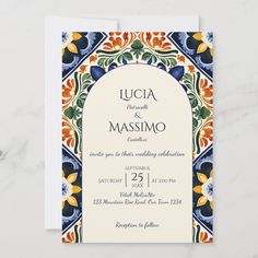 an ornate wedding card with the words lucia and massmo on it, in blue, orange