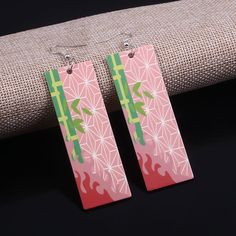 △ Handmade
△ Material: Acrylic
△ Metal: Alloy
△ Materials: lead-free, nickel-free, tin-free, harmless to health

EXCLUSIVE Hanafuda Earrings Anime Inspired for Cosplay!

Get yourself a pair of stunning tanjiro earrings which are the perfect gift to wear for general use and more specifically cosplay! These hanafuda earrings are the perfect gifts for any beloved anime fan! Demon Slayer Earrings, Hanafuda Earrings, Tanjiro Demon Slayer, Anime Earrings, Anime Jewelry, Anime Inspired, Acrylic Earrings, Green Crystals, Ear Jewelry