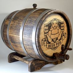 a wooden barrel sitting on top of a stand