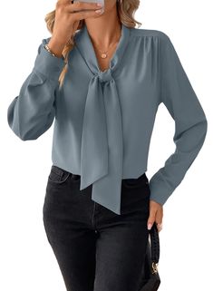 PRICES MAY VARY. Material:made from 100% Polyester,this blouse is crafted from a soft fabric that is incredibly lightweight and flowy,making it comfortable to wear all day Features:this casual blouse has a front bow tie knot style;long sleeves;a V-neckline;solid color;button cuffs.It is perfect for office ladies,makes you stand out in a crowd Matched:this blouse shirt is easy to pair with skirts;jeans;high waist shorts;high-heeled shoes;necklace and earrings,giving you a timeless and stylish look Occasion:perfect choice for a wide range of occasions,including daily life,vacation,holidays;travel;office or work settings;home;dates.It makes an ideal gift for friends;mom;wife or other family Package Content:one Women Tops.The tie neck blouse is available in sizes S-2XL.Garment Care:hand wash o Office Blouses For Women Work Outfits Business Attire, Office Blouses For Women Work Outfits, Shomiz Blouses, Work Blouses For Women, Tie Knot Styles, Bow Tie Knot, Family Package, Skirts Jeans, Awesome Blouse