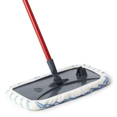 a mop with a red handle on it