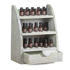 This beautiful essential oils bottle rack/stand is ideal for organizing your precious oils in desktop, countertop. Made from candlenut, it holds up to 45 oil bottles, features flexible bottle design that can accommodate with 10ml, 15ml, 20ml, 30 ml bottles. The staggered row design allows you to read the bottle labels easily. Effortlessly protect and organize your essential oil collection while keeping your oils safe in a sturdy, upright position. Specification: Color: Rustic Gray Material: Wood Essential Oils Storage, Essential Oils Organization, Nail Polish Display, Essential Oil Holder, Essential Oils Collection, Polish Display, Countertop Organization, Nail Polish Storage, Essential Oil Storage