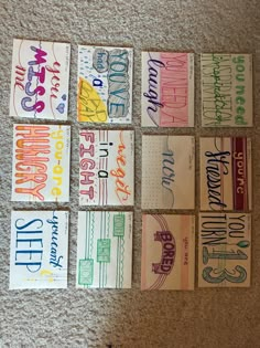 six different colored cards with writing on them