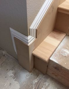 an unfinished stair case is shown in this image