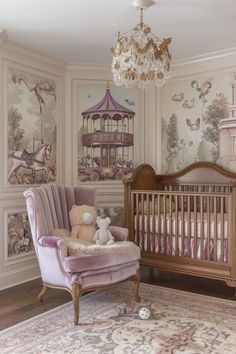 a baby's room with a crib, rocking chair and wallpaper on the walls