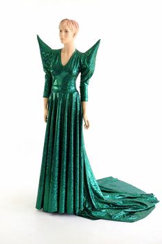 a mannequin dressed in a green dress