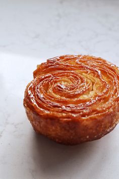 a pastry sitting on top of a white counter