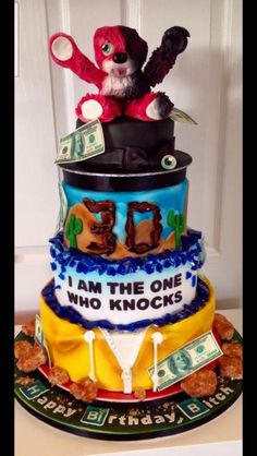 there is a cake made to look like it has money on top and the words i am the one who knocks