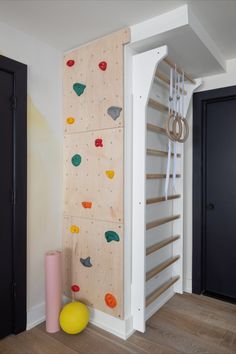 there is a climbing wall in the room