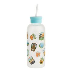 a glass water bottle with stickers on the side and a straw sticking out of it