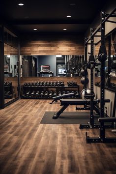 an empty gym with rows of exercise equipment