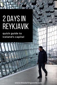 a man walking in front of a glass building with the words 2 days in reykjavk