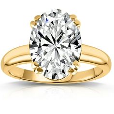 a yellow gold engagement ring with an oval cut diamond in the center, on a white background