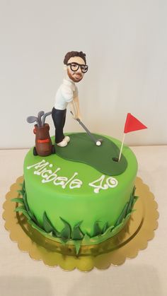 a birthday cake with a golf player on it