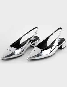 Steve Madden Christann Slingback Block Heel Shoes. Crafted With A Sleek Silver Metallic Upper, These Shoes Add A Dazzling Statement To Any Outfit. Featuring A Comfortable Block Heel And Adjustable Slingback Strap, These Shoes Offer Both Style And Support For All-Day Wear. Pointed Toe. Cushioned Footbed. Synthetic Lining, Sock, And Sole. 1'' Heel Height. Imported. Trendy Formal Closed Toe Slingback Pumps, Trendy Flat Heel Slingback Pumps For Party, Trendy Formal Slingback Pumps With Closed Toe, Party Flat Heel Slingback Pumps With Heel Strap, Trendy Closed Toe Formal Slingback Pumps, Trendy Closed Toe Slingback Pumps For Formal Occasions, Trendy Flat Heel Slingback Pumps For Formal Occasions, Spring Party Slingback Mules, Silver Patent Leather Heels For Spring