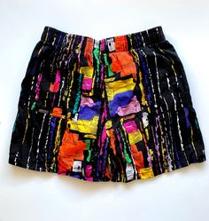 "S p e c i f i c s . . . Label: Ocean Breeze Tagged Size: -- Approx Fit: XS - S Color: Black // Red // Grey // White // Yellow // Purple // Orange Material: Cotton // Elastic Waistband // Brief Liner Condition: Overall in Amazing New Vintage Condition (These are in New Vintage Condition, no signs of wear or flaws!) M e a s u r e m e n t s . . . (side to side // laying flat) Waist - approx. 12.5\" - 14.5\" elastic waistband Hips - approx. up to 17\" Length - approx. 14\" Inseam - approx. 3.5\"" Vintage Summer Shorts With Pockets, 90s Style Shorts With Pockets For Summer, 90s Style Summer Shorts With Pockets, 90s Inspired High-waisted Shorts For Summer, Retro Black Spring Shorts, 90s Black Summer Shorts, Black 90s Style Summer Shorts, Vintage Black Shorts For Summer, Retro Black Summer Bottoms