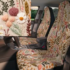 the interior of a car with floral seat covers